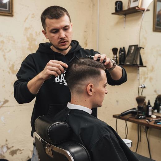 After example haircut with cleaner lines and styling
